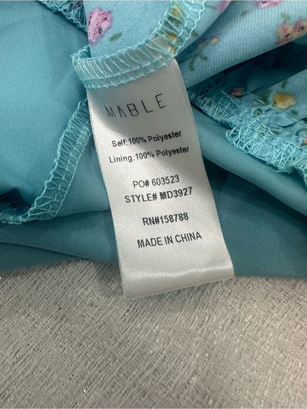 Mable Smocked Off-Shoulder Floral Mini Dress in Light Blue - Picture 11 of 12